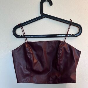 Faux leather crop top.